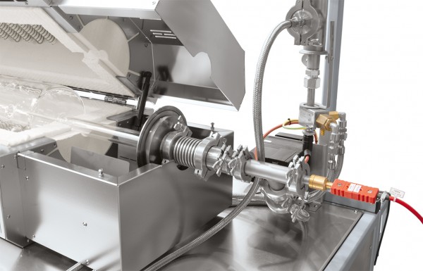 Gas tight rotating union with gas cooler and charge thermocouple